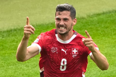 Remo Freuler celebrates after scoring Switzerland's opening goal 